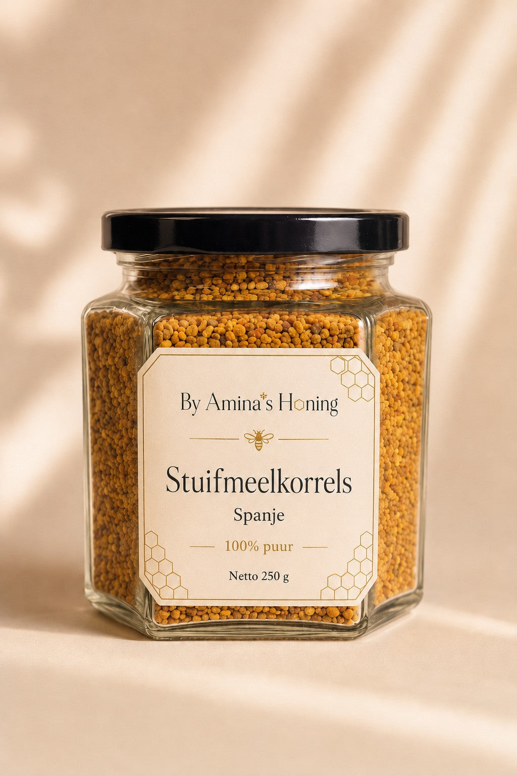 By Amina's Honing stuifmeelkorrels bijenpollen 250 g – voorkant, glazen pot vol korrels met etiket Spanje, 100% puur